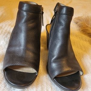 Black perforated leather heeled sandals